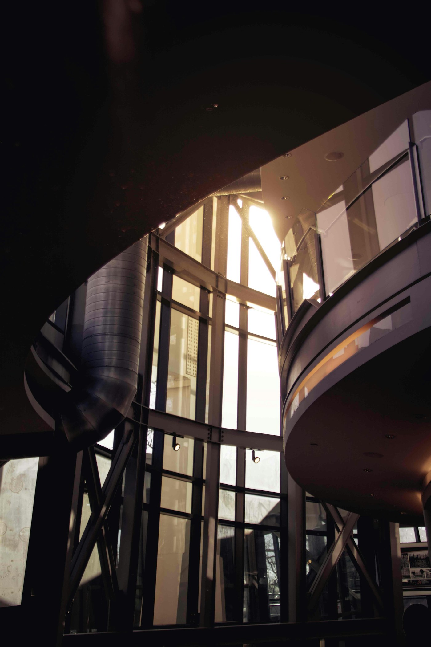 Commercial interior with tall sunlit glass