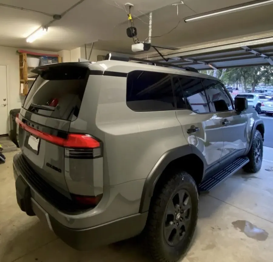 Lexus GX with ceramic window tint, rear three-quarter view