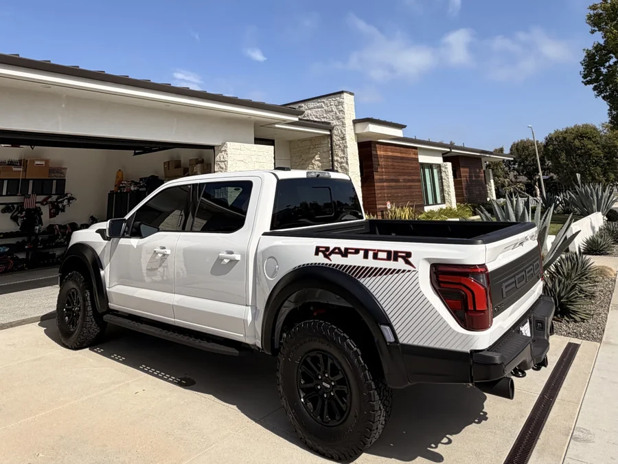 Ford F-150 Raptor window tint — rear three-quarter view
